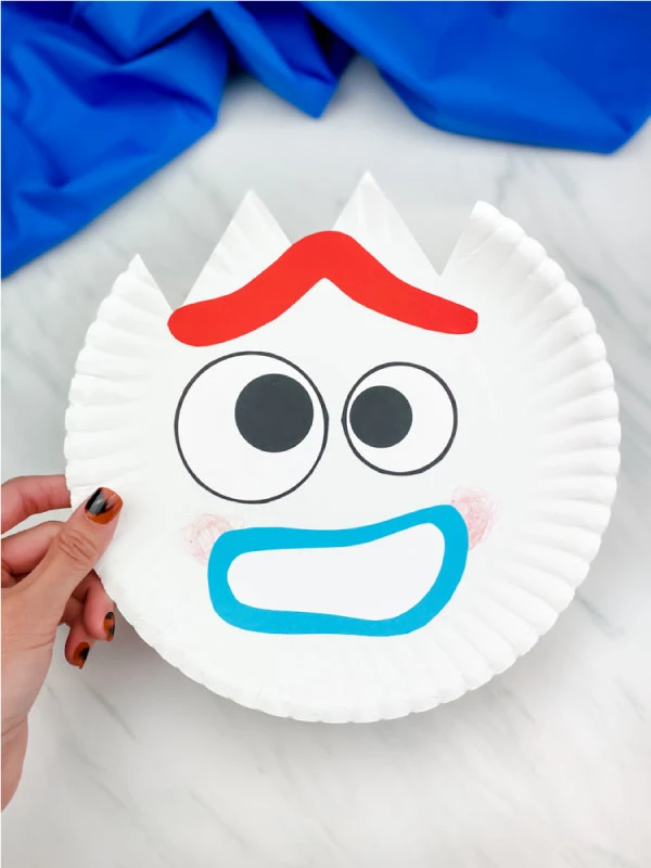 hand holding worried paper plate forky craft