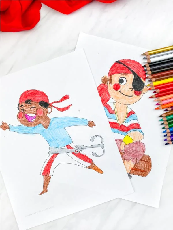 two pirate boy coloring pages with colored pencils