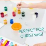 a child's hand painting with the words the best art gifts for kids on the top