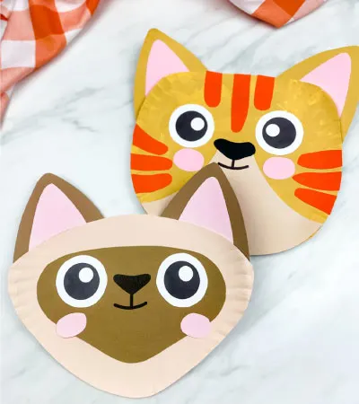 tabby paper plate cat craft with siamese paper plate cat craft in front