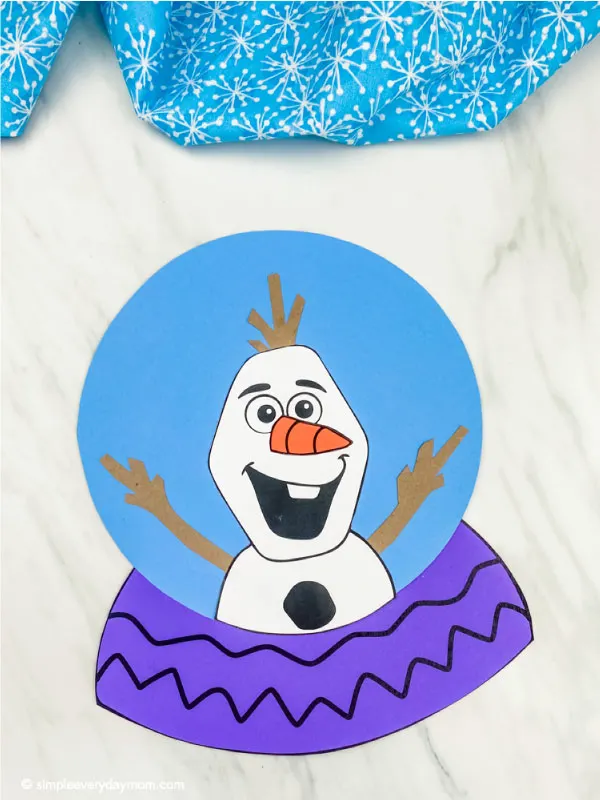 closeup of purple Olaf snowglobe craft