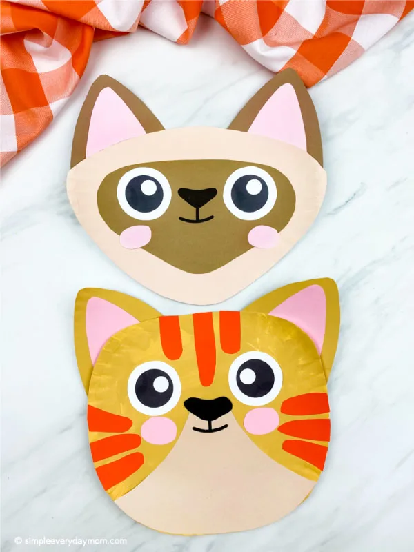 a siamese paper plate cat craft with tabby cat paper plate cat craft below it