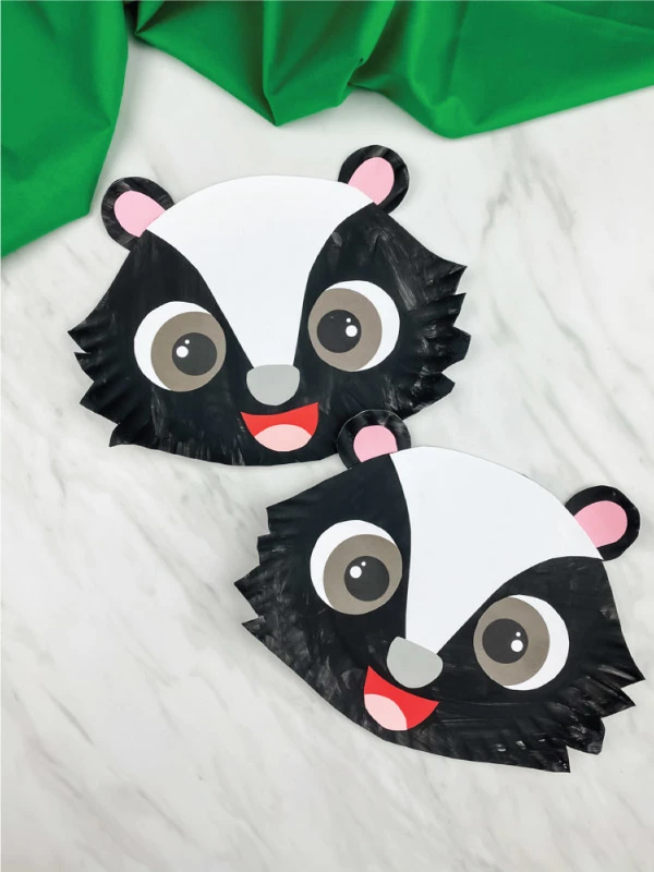 two paper plate skunk crafts