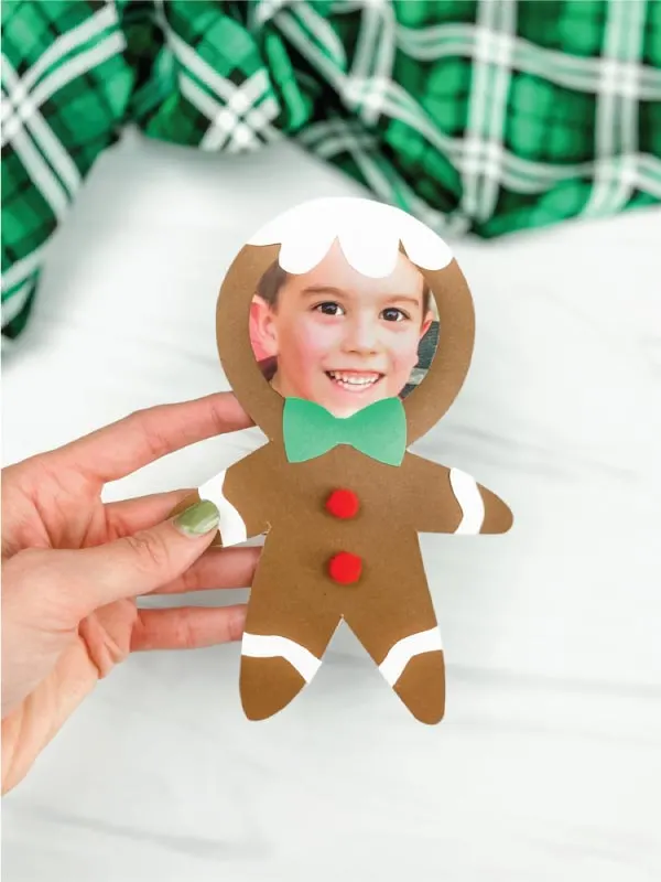 hand holding photo gingerbread man craft