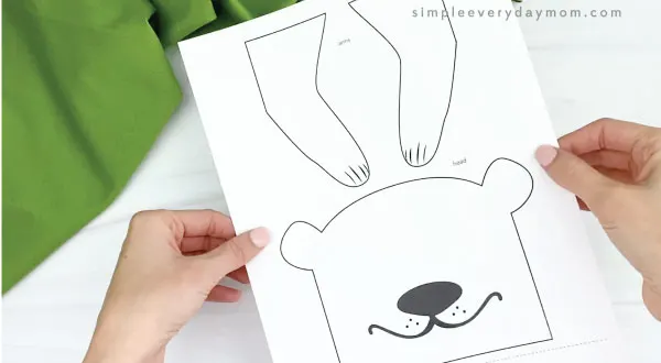hands holding paper bag groundhog craft template