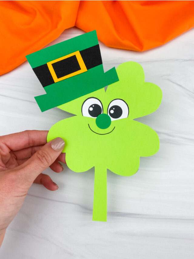 hand holding shamrock leprechaun craft