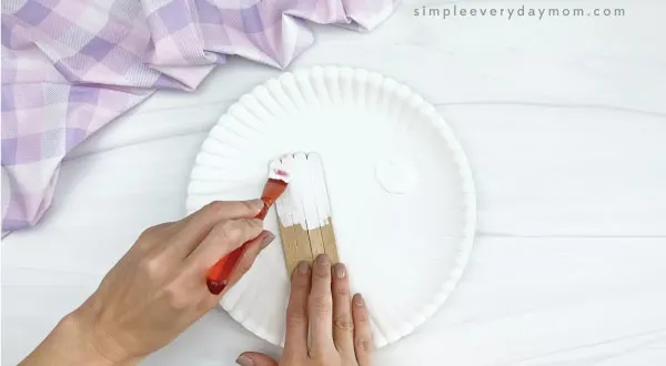 hand painting popsicle stick white