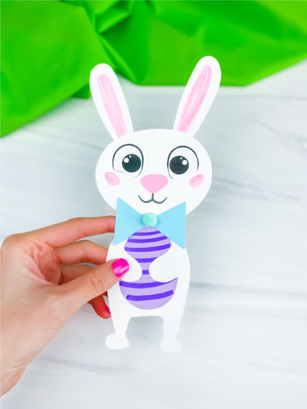 hand holding Easter bunny craft