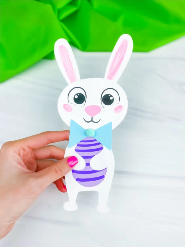 hand holding Easter bunny craft
