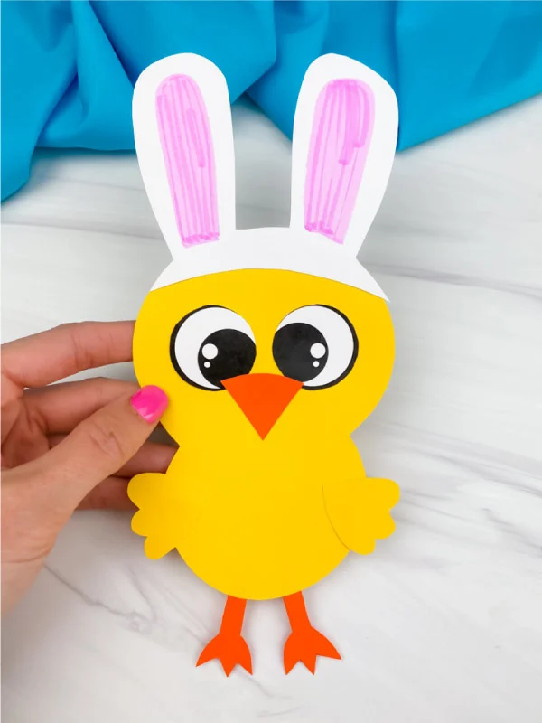 hand holding Easter chick craft
