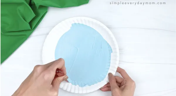 hand painting paper plate blue