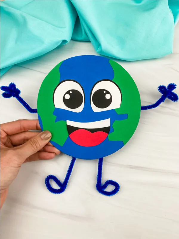 hand holding paper Earth craft #1