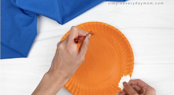 hand painting paper plate orange