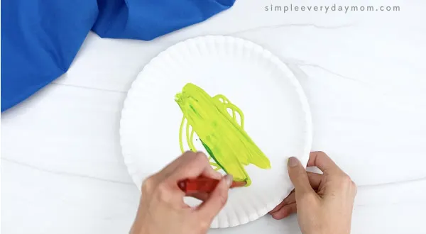 hand painting paper plate lime green