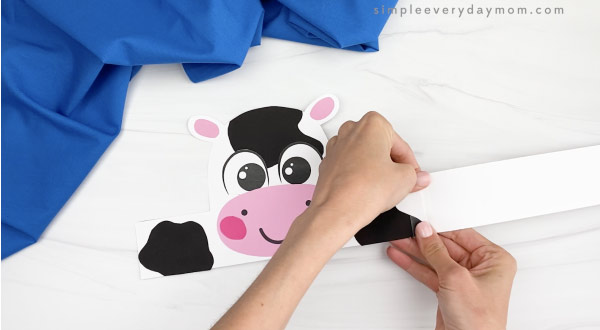 hand taping extender to cow headband craft