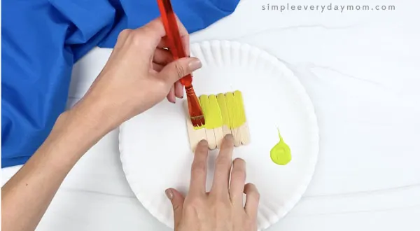 hand painting popsicle stick green