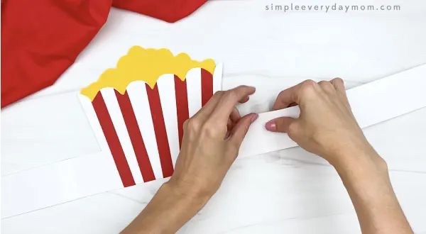 hand taping extender to popcorn headband base