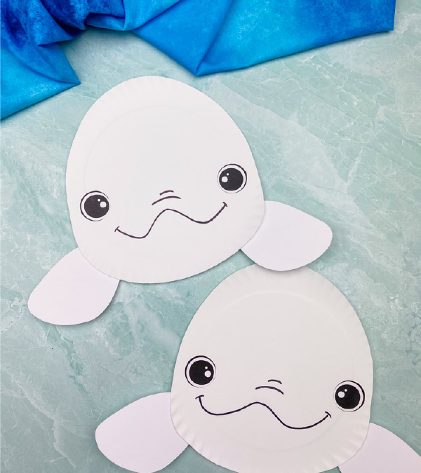 2 paper plate beluga whale crafts