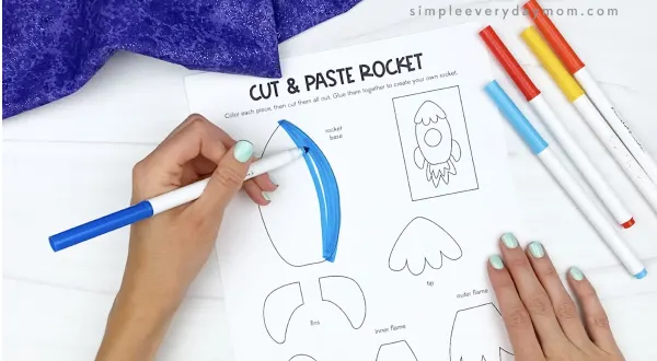 hand coloring in cut and paste rocket pieces