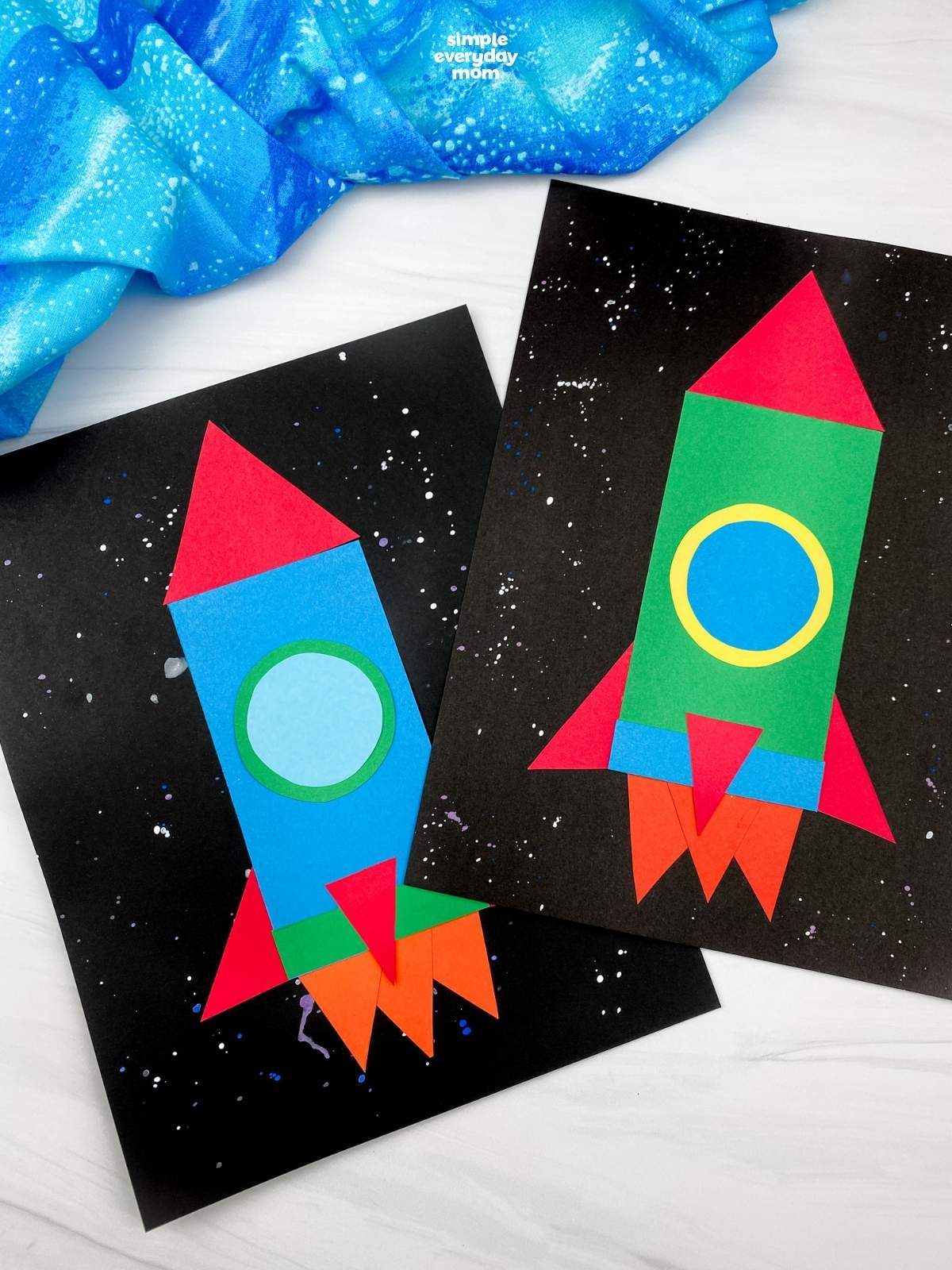 Two colorful paper rocket crafts made from basic shapes on black, star-speckled backgrounds.