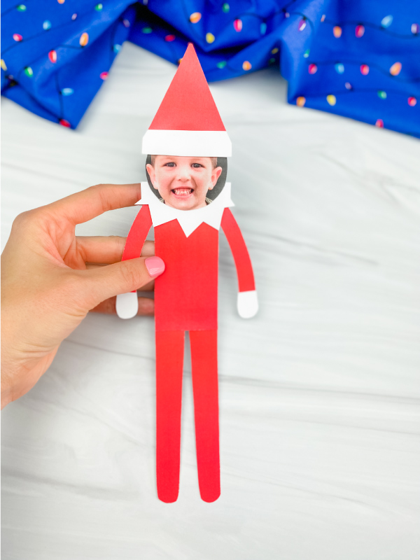 hand holding elf on the shelf photo craft