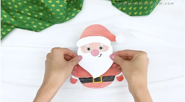 hand gluing head to printable santa craft