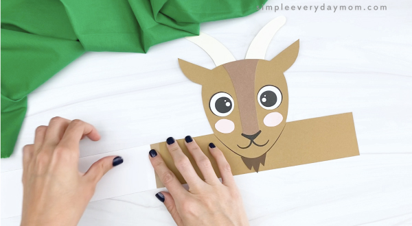 hand taping extender to goat headband craft