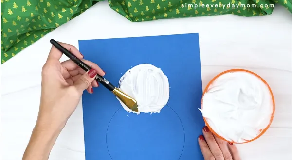 hand painting snowman with puffy paint