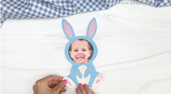 hand gluing foot to bunny photo craft