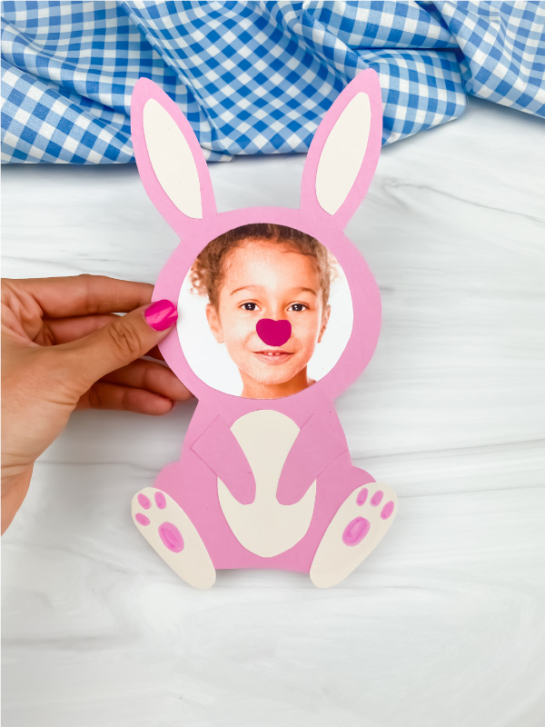 hand holding Easter bunny photo craft