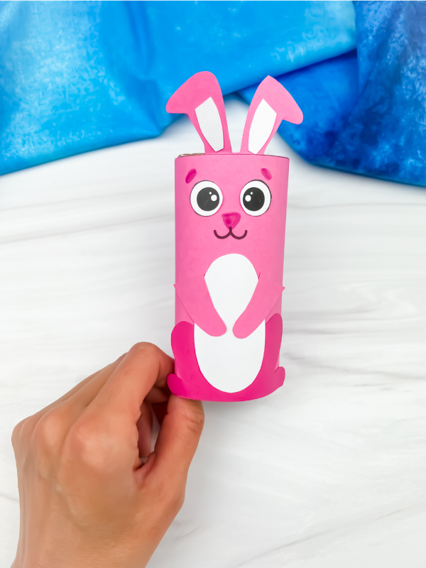 hand holding tp roll bunny craft