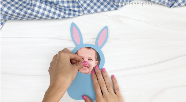 hand gluing bunny nose onto photo