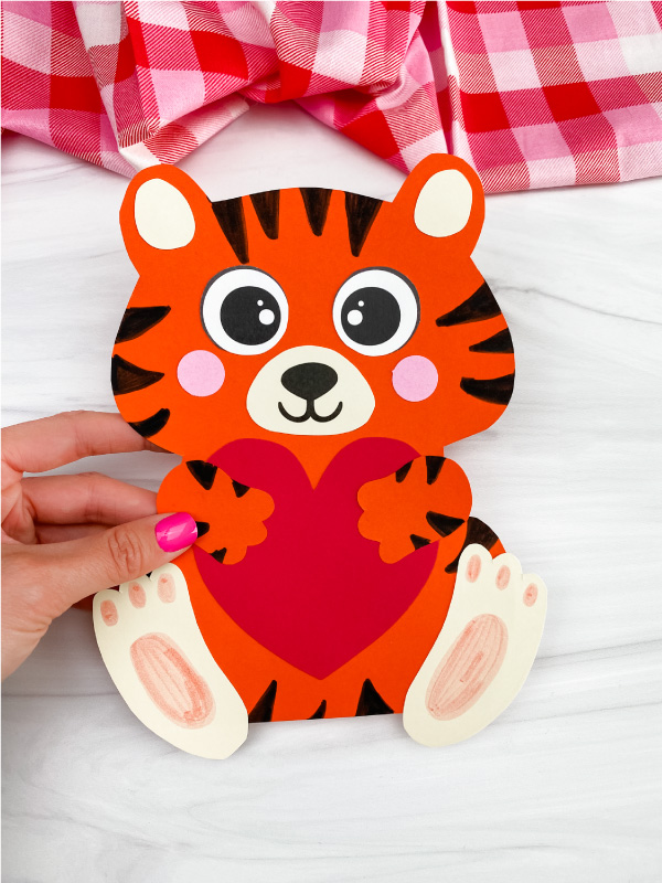 hand holding tiger Valentine craft