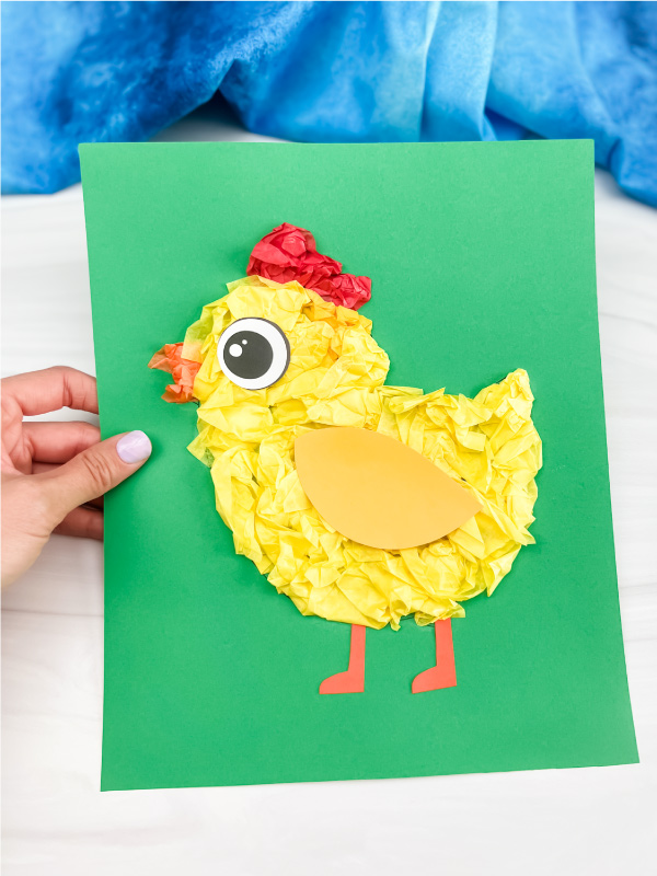 hand holding tissue paper chick craft