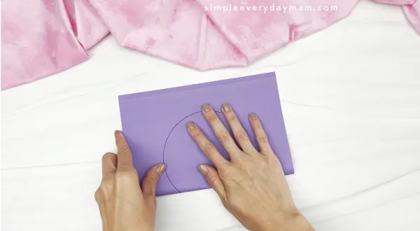 hand folding Mickey Mouse card craft in half