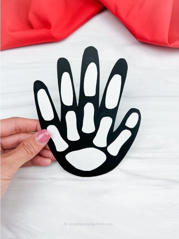 hand holding x ray handprint craft