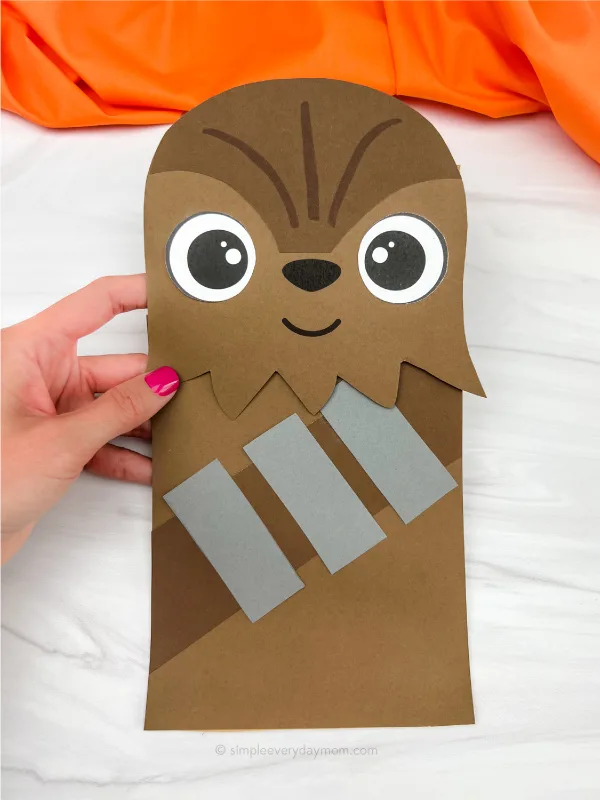 hand holding Chewbacca paper bag craft