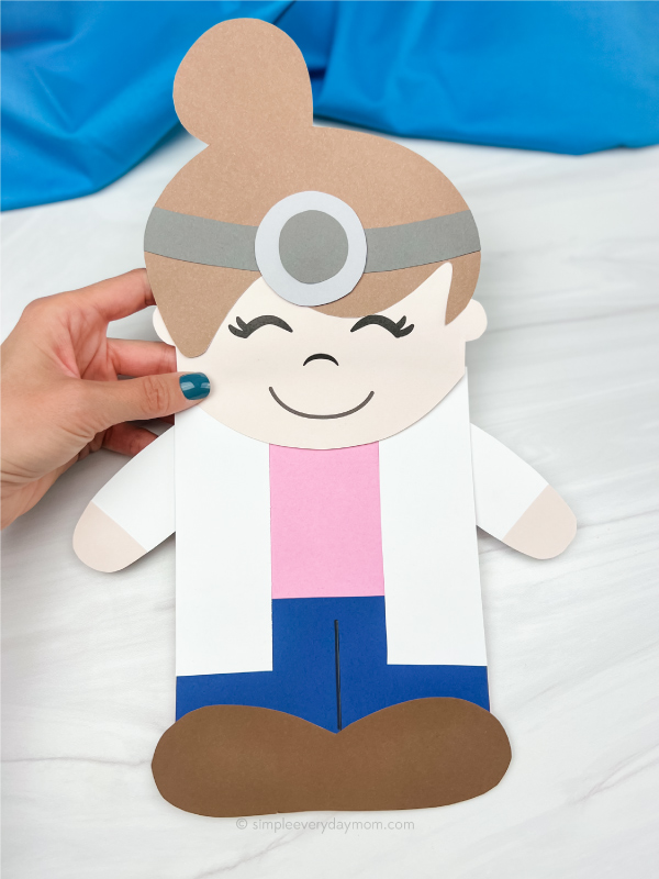 hand holding girl doctor puppet craft