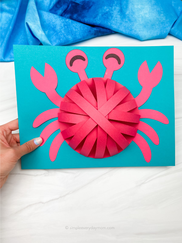 hand holding 3D crab craft