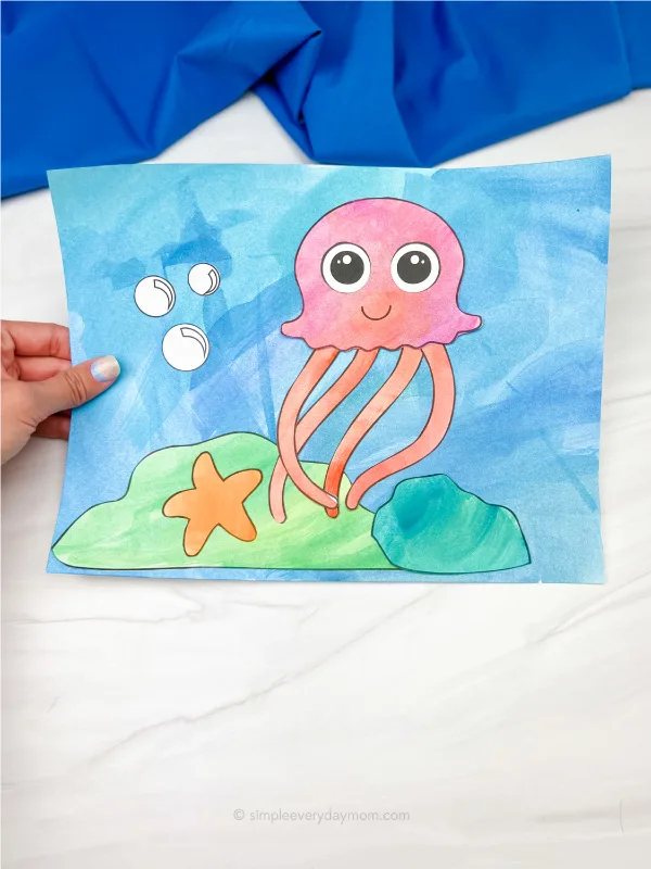 hand holding jellyfish art project