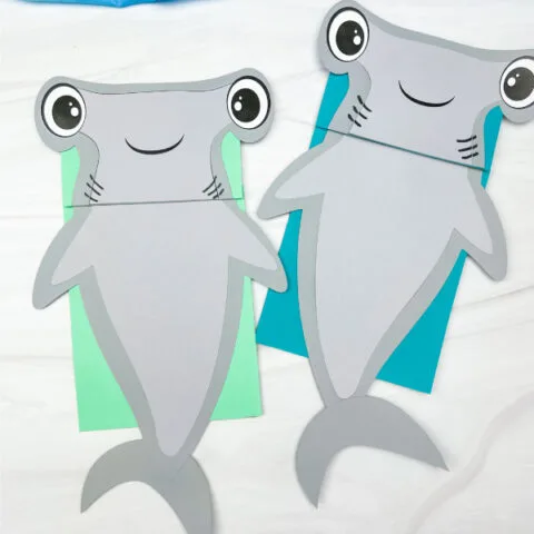 2 hammerhead shark puppets