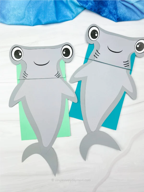 2 hammerhead shark puppets