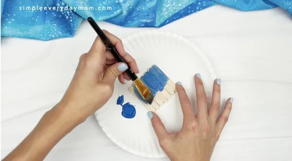 hand painting popsicle sticks blue