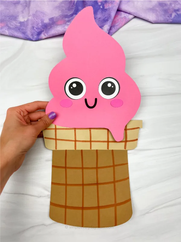 hand hold pink paper bag ice cream craft
