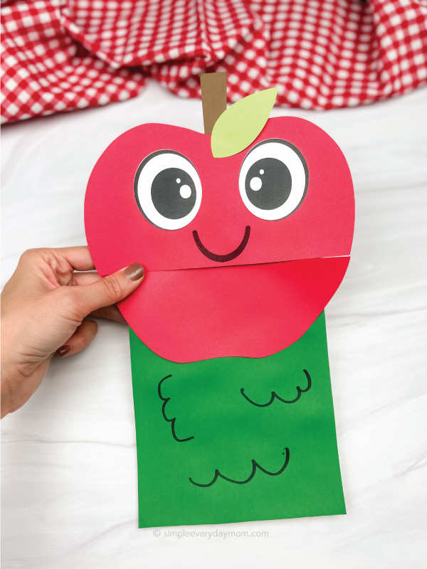 hand holding paper bag apple craft