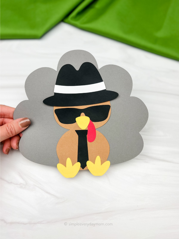 hand holding spy turkey craft