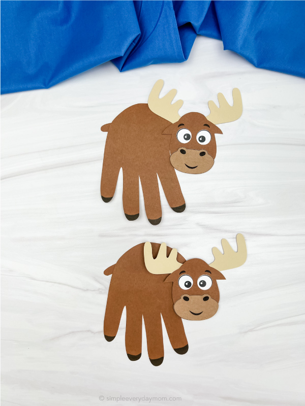 2 moose handprint crafts