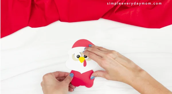 hand gluing suit to Santa turkey disguise craft