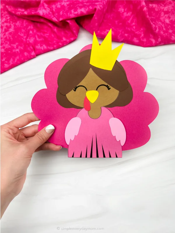 hand holding princess turkey disguise craft
