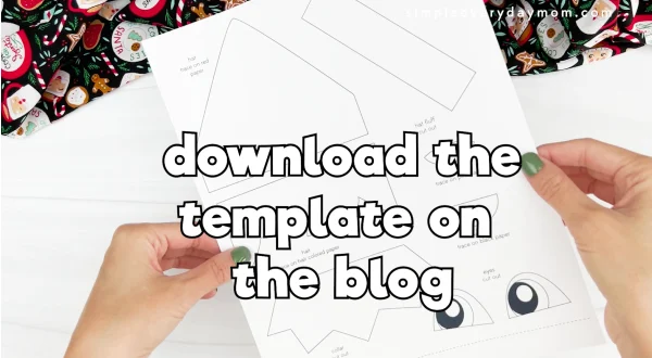 hands holding a picture of the printed template with the words 'download the template on the blog"